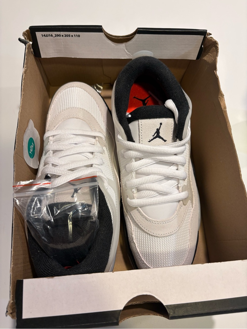 Jordan Men's White and Black Low-Top Sneakers with Red Insole Accent